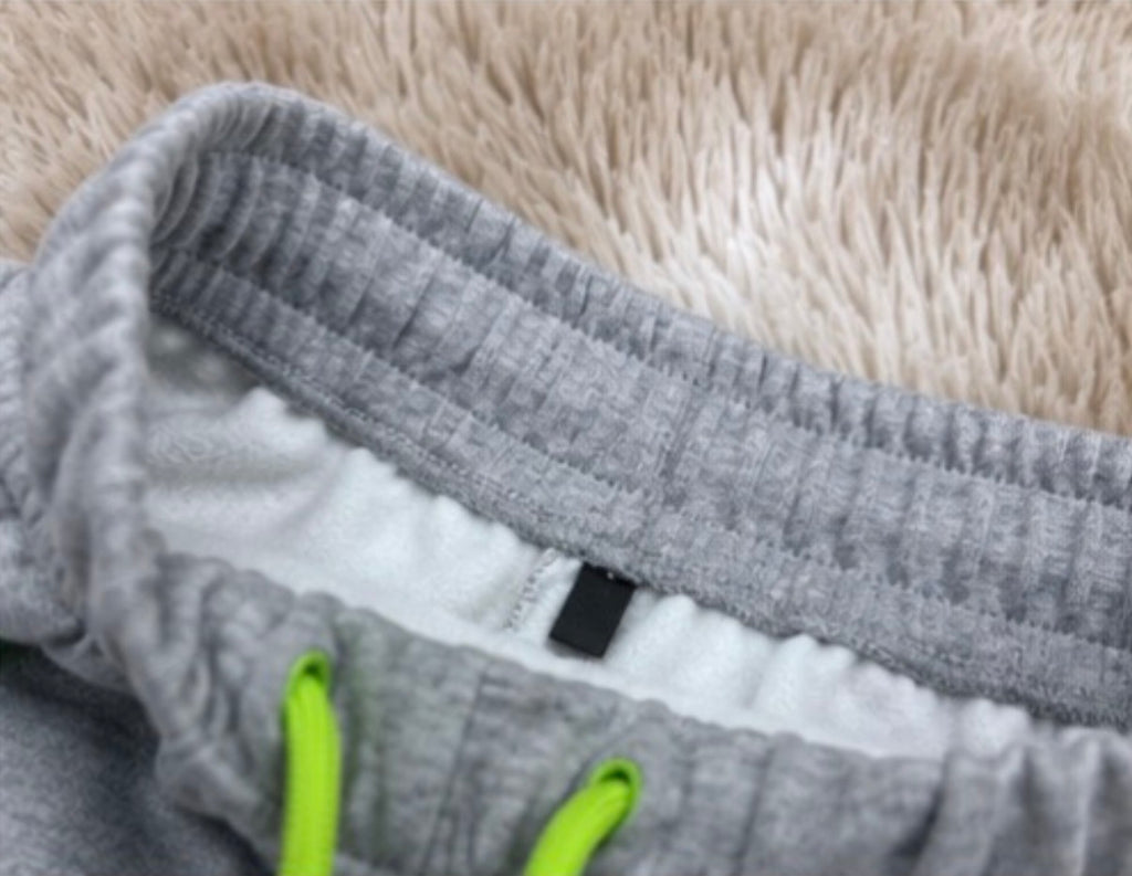 Calça de moletom importada com zíper em cores vibrantes