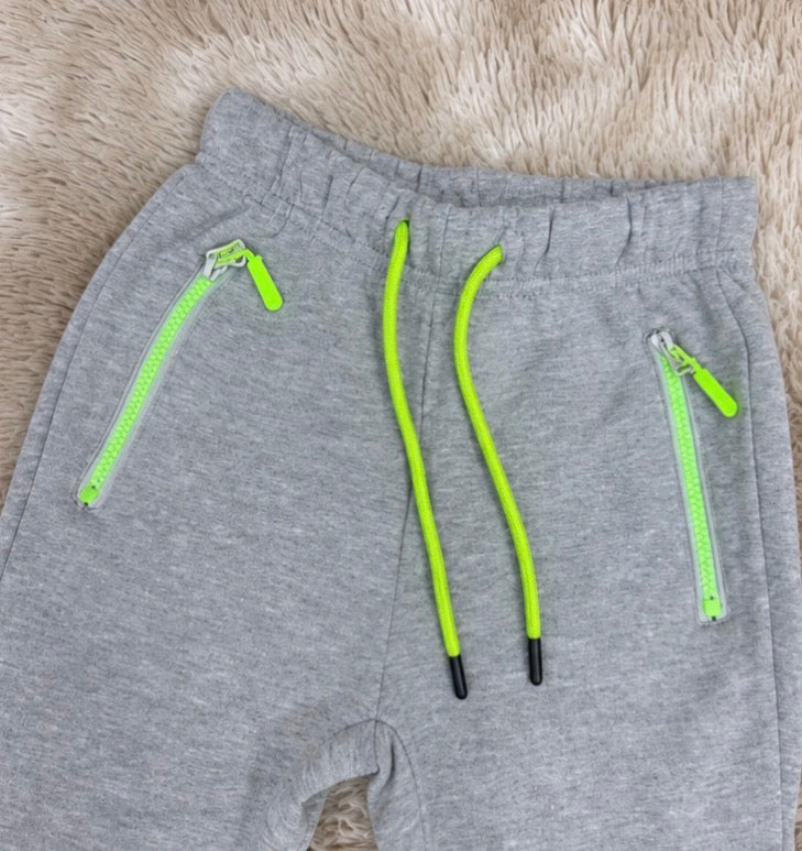 Calça de moletom importada com zíper em cores vibrantes